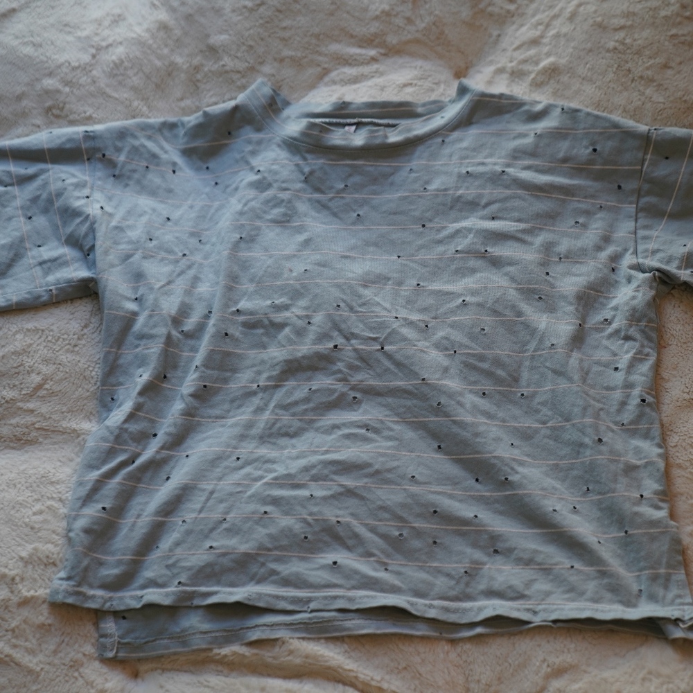 Blue and white striped ripped t-shirt